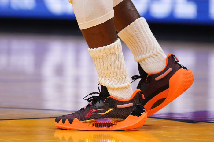View of Jimmy Butler's black and orange shoes.